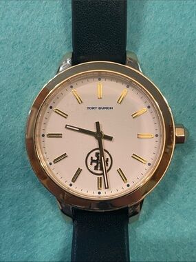 Tory Burch White Dial Watch with Gold-Tone Case and Black Strap       TBW 1205